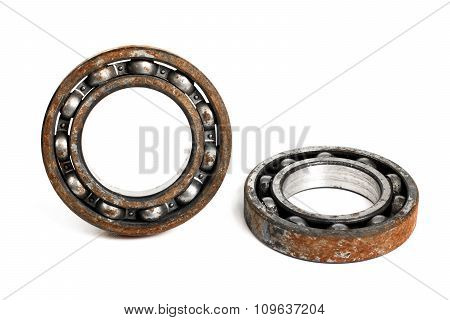 Old and rusty ball bearing, isolated on white background
