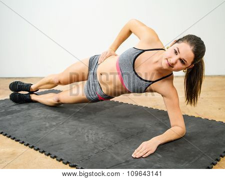 Woman Doing Side Elbow Plank