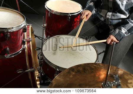 Drummer playing the drums closeup