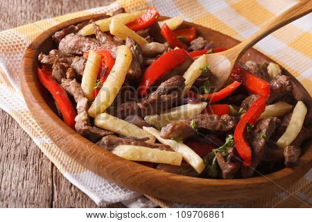 Beef With Vegetables - Lomo Saltado Close-up On A Plate. Horizontal