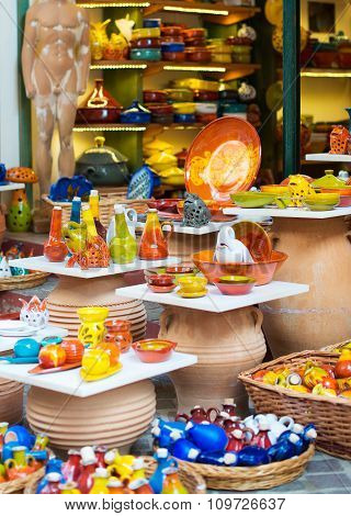 Colorful pottery in the Mediterranean outdoor market.