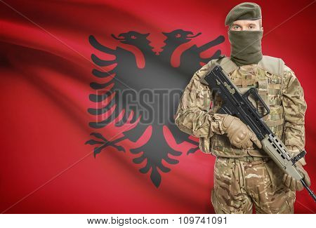 Soldier Holding Machine Gun With Flag On Background Series - Albania