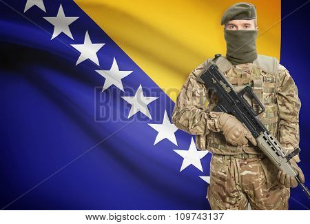 Soldier Holding Machine Gun With Flag On Background Series - Bosnia And Herzegovina