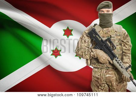Soldier Holding Machine Gun With Flag On Background Series - Burundi