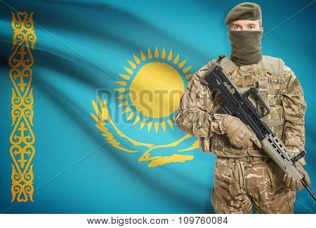 Soldier Holding Machine Gun With Flag On Background Series - Kazakhstan