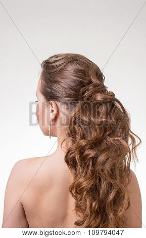 Beautiful long wavy hair. Back view