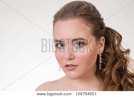 Young brunette lady with a beautiful hair