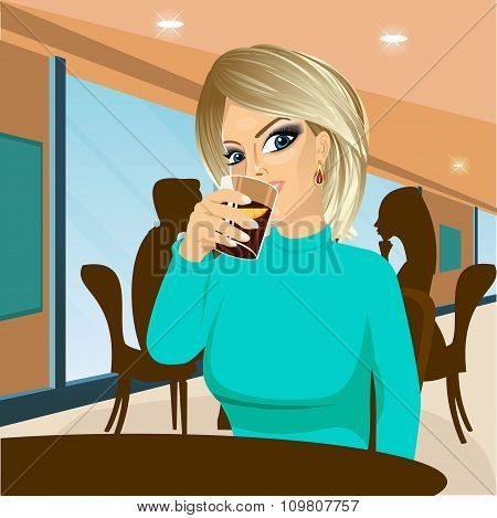 young woman with glasses drinking beverage