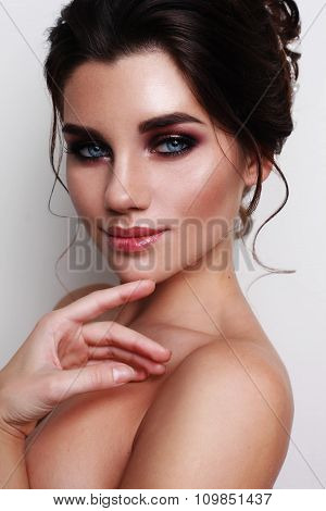 Cute lady with blue eyes.