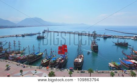 ALANIA - AUG 16, 2015: Many touristic vessels in Alania Sea Port at summer sunny day. Aerial view videoframe