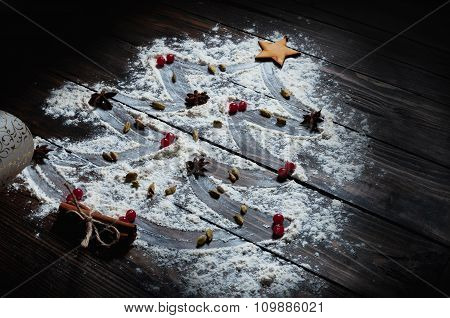 Christmas tree with the flour, cinnamon and anise star spices