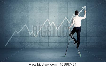 A man standing on a ladder and drawing a chart on blue wall background with exponential progressing curve, line