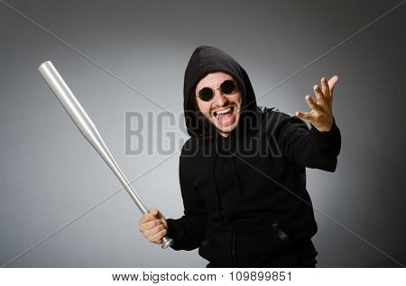 Aggressive man with basebal bat 