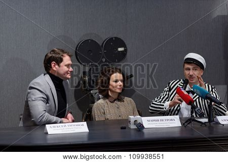 ST. PETERSBURG, RUSSIA - NOVEMBER 25, 2015: Press conference of A. Yagudin (right), M. Petrova, and A. Tikhonov  (left) in Lenfilm. Famous figure skaters presented the Christmas shows of Ilya Averbukh