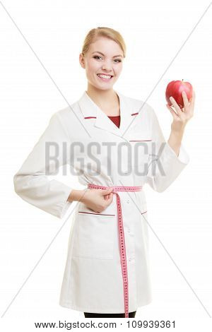 Doctor Specialist Holding Fruit Apple Measuring Waist
