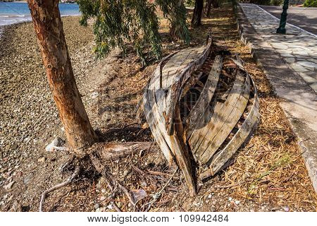 An Old Destroyed Boat On The Beach