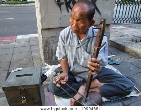 Oudere Thai blind man, Bangkok, Thailand.