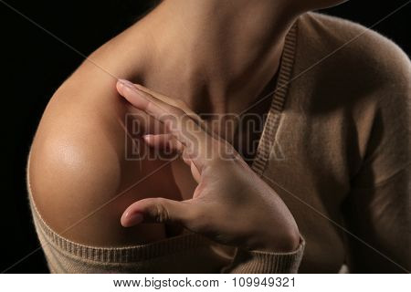 View on woman's neck, collarbone and shoulders, close-up