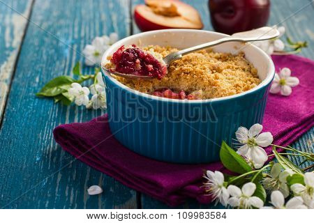 Plums Crumble Pie On Blue Ramekin