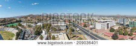 WINDHOEK NAMIBIA - JUNE 17 2017: An aerial panorama of the southern parts of Windhoek the capital city of Namibia. Windhoek High School and the Alte Feste is visible to the left