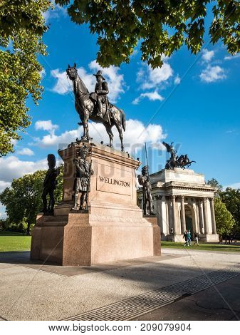 Commemorative landmarks of a statue and triumphal arch in central London paying tribute the 19th Century English military leader Arthur Wellesley the 1st Duke of Wellington.