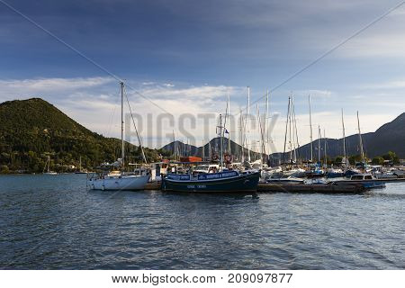 NYDRI, GREECE - OCTOBER 2, 2017: Boats in the harbour of Nydri village on Lefkada island in Greece on October 2, 2017.