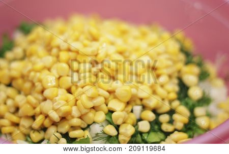 Fresh salad with canned corn cabbage and parsle