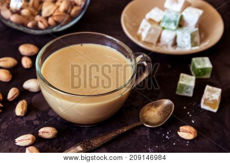 Coffee With Milk, Pistachios And Turkish Delight