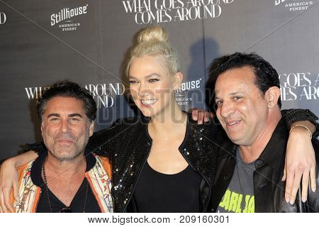 LOS ANGELES - OCT 11:  Gerard Maione, Karlie Kloss, Seth Weisser at the What Goes Around Comes Around One Year Party at the What Goes Around Comes Around Store on October 11, 2017 in Beverly Hills, CA