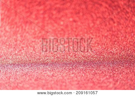 Some abstract defocused bright red glitter background