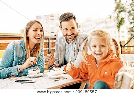 Family Enjoying Restaurant