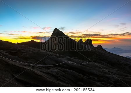 View from the top of Low's Peak of Mountain Kinabalu,Sabah during morning sunrise.Its the highest mountain in Malaysia is one of Borneo's most popular tourist attractions & climbers.