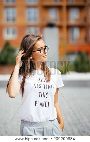 Summer Sunny Lifestyle Fashion Portrait Of Young Stylish Hipster Woman Walking On Street, Wearing Cu