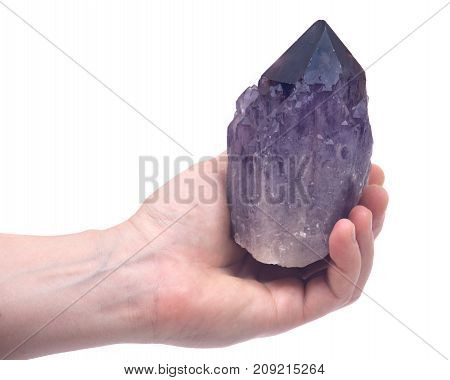 Woman's hand holding Ametrine lightbrary point from Bolivia isolated on white background