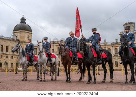 Gatchina St. Petersburg Russia - September 30 2017: Horse show of Cossacks on the parade ground of the Gatchina Palace. The construction of Cossacks on the parade ground of the Gatchina Palace.