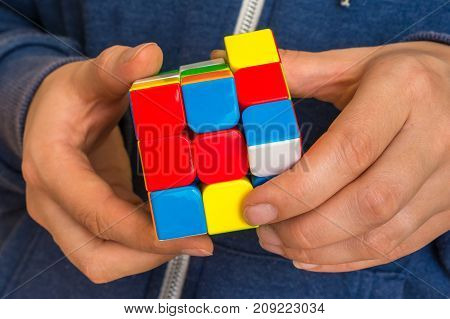 Rubik's Cube In Female Hands - Game For Solving Problems