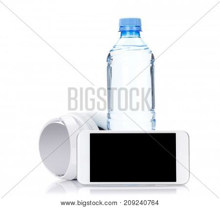 Fitness concept. Smartphone, water bottle and headphones. Isolated on white background