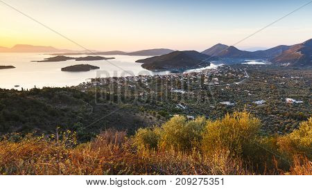 Morning view of Nydri village on Lefkada island and several islands, Greece.