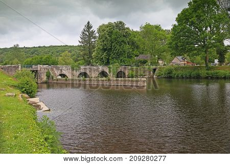 Old natural stone bridge over the Blavet Brittany France