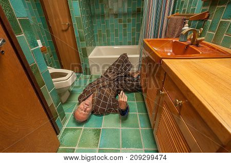 A senior man fell on a bathroom floor