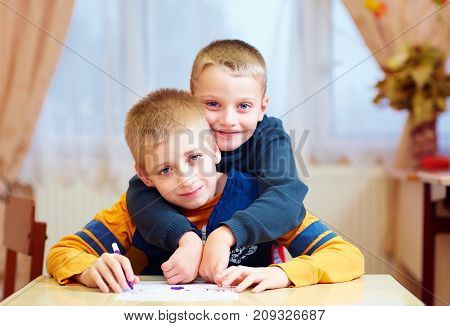 Two Cute Kids, Friends In Rehabilitation School For Kids With Special Needs