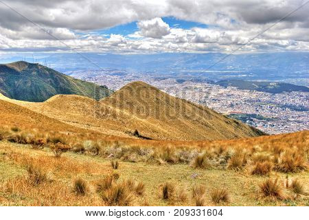 View of the city of Quito and the ecuadorian Andes from the Teleferico touristic attraction, at the top of the Pichincha volcano. Quito, Ecuador.