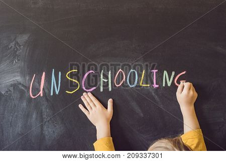 Concept Unschooling Home Learning Back To School Color Chalk On Black Blackboard Background In Row T