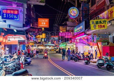 TAICHUNG TAIWAN - JULY 18: This is a street in Fengjia night market which is said to be the biggest night market in Taiwan on July 18 2017 in Taichung