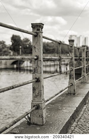 old historical railing on the banks of the river Spree in Berlin