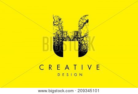 H Logo Letter Made From Black Tree Branches