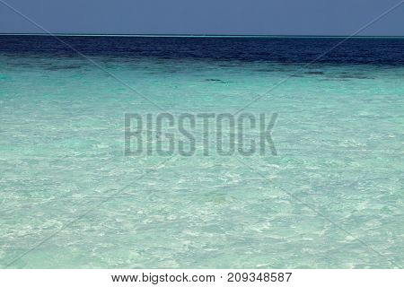 All shadows of blue in tropical sea. Natural tropical water paradise. Travel tropical island resort. Ocean nature tranquility.
