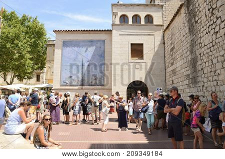 FIGUERES, SPAIN - JULY 26, 2017: People at a queue to get into the Dali Theater and Museum in Figueres a city of Girona Catalonia Spain.