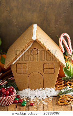 Gingerbread house ready to be decorated with candy for Christmas