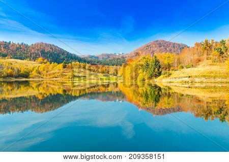 View of Mrzla vodica lake and Risnjak mountain, autumn landscape, Gorski kotar, Croatia
